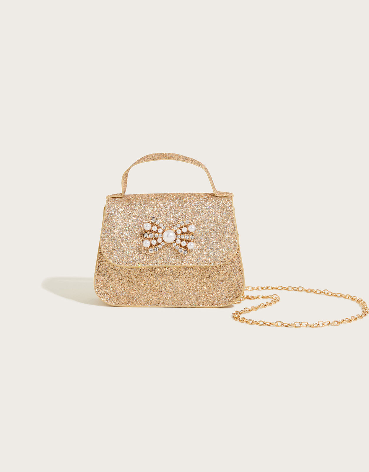 Monsoon gold bag clearance