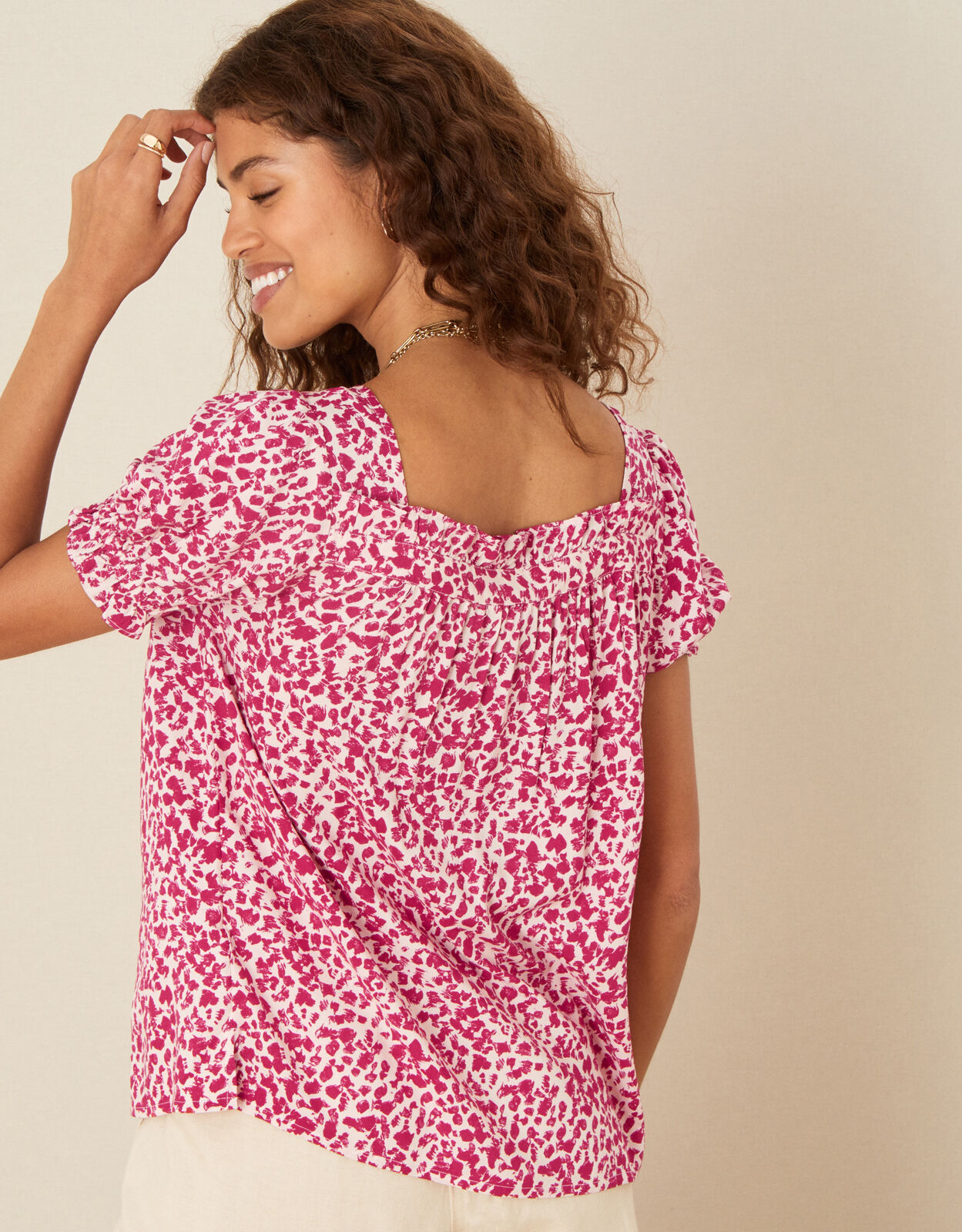 next red leopard print top