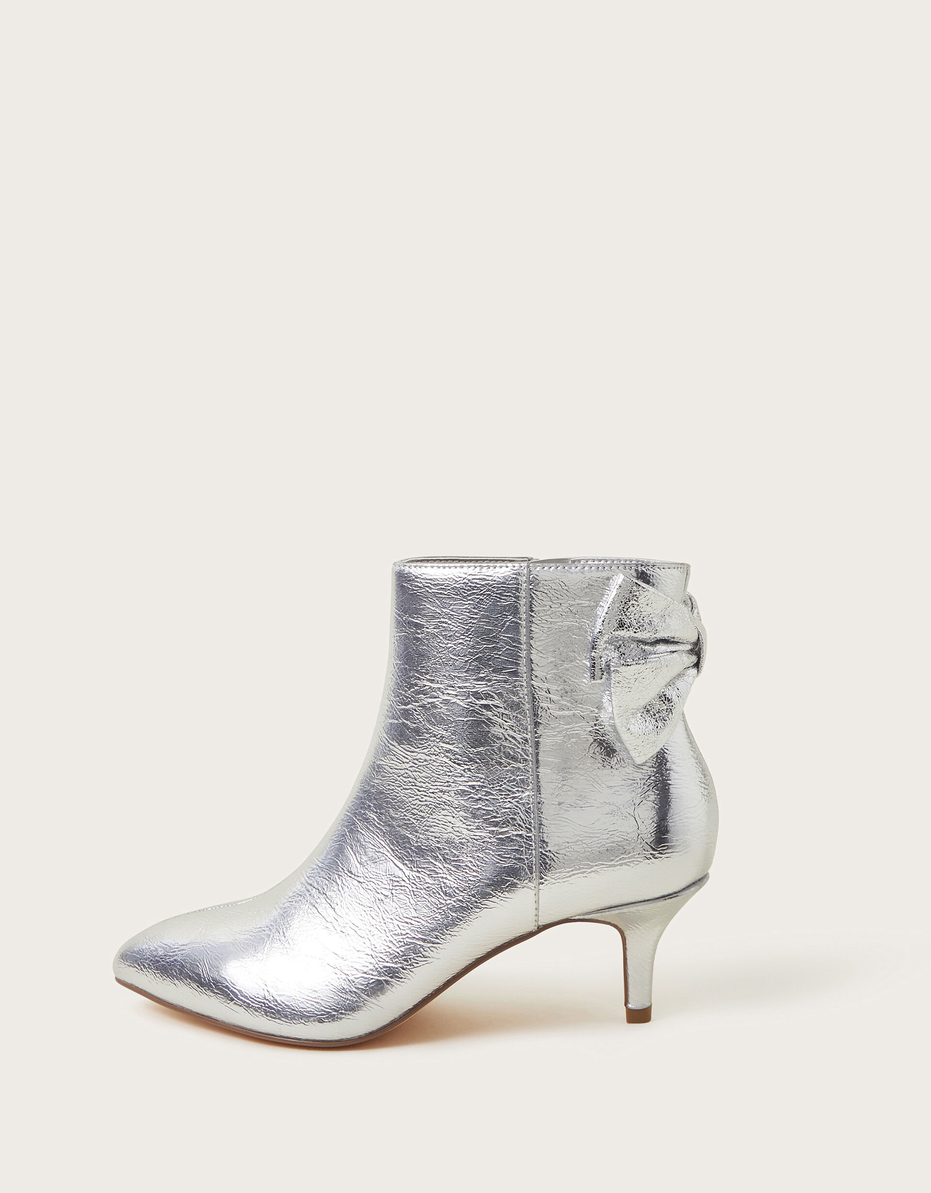 Silver boots low heel hotsell