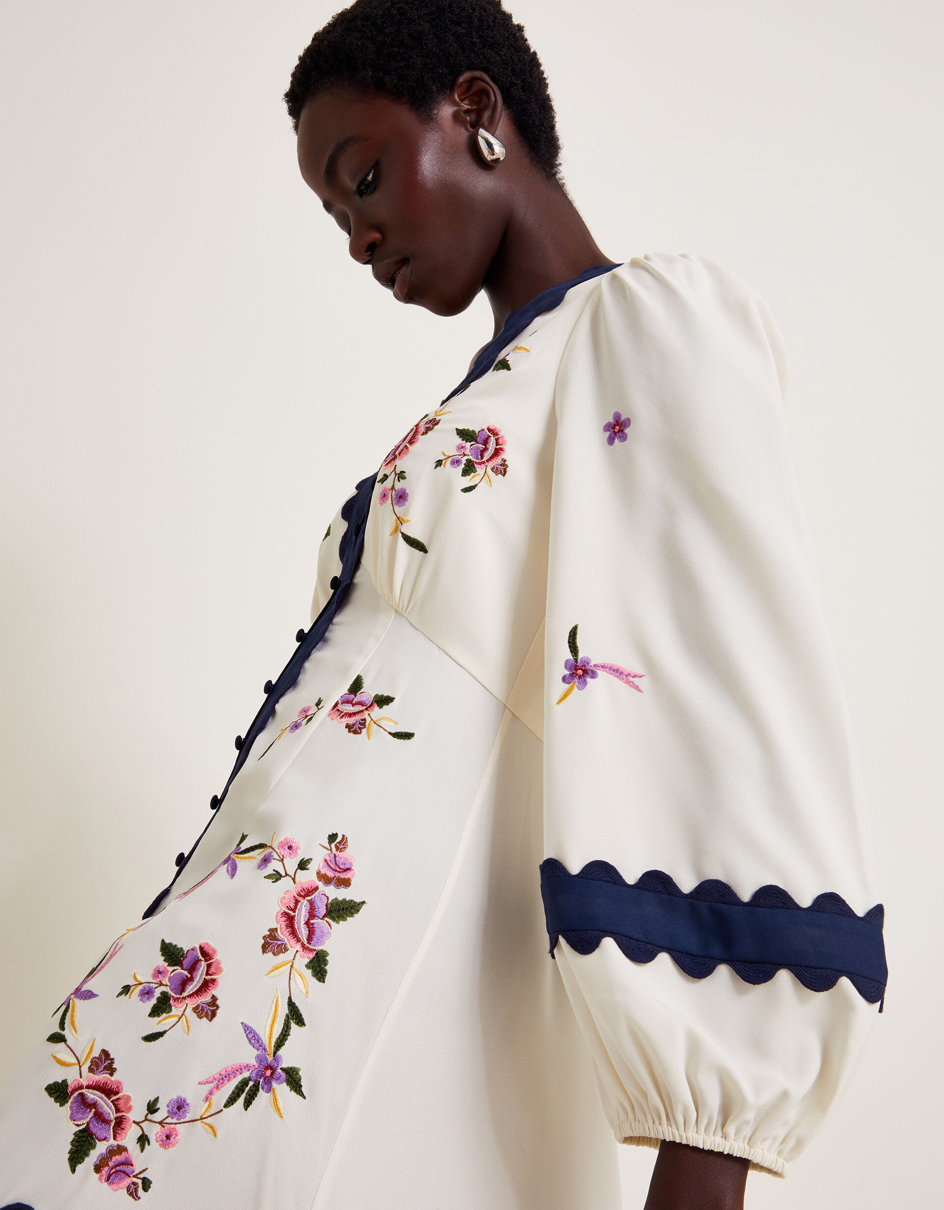 Embroidered ivory dress best sale