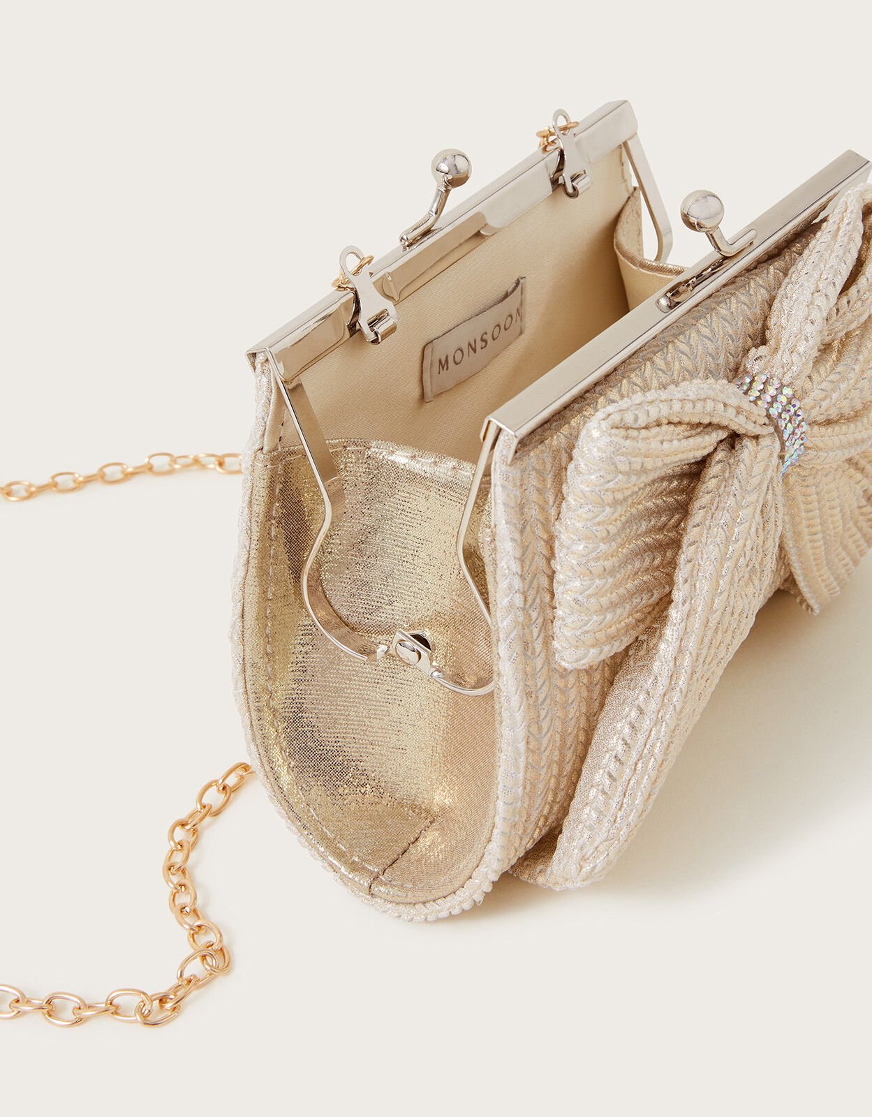 Monsoon gold bag deals