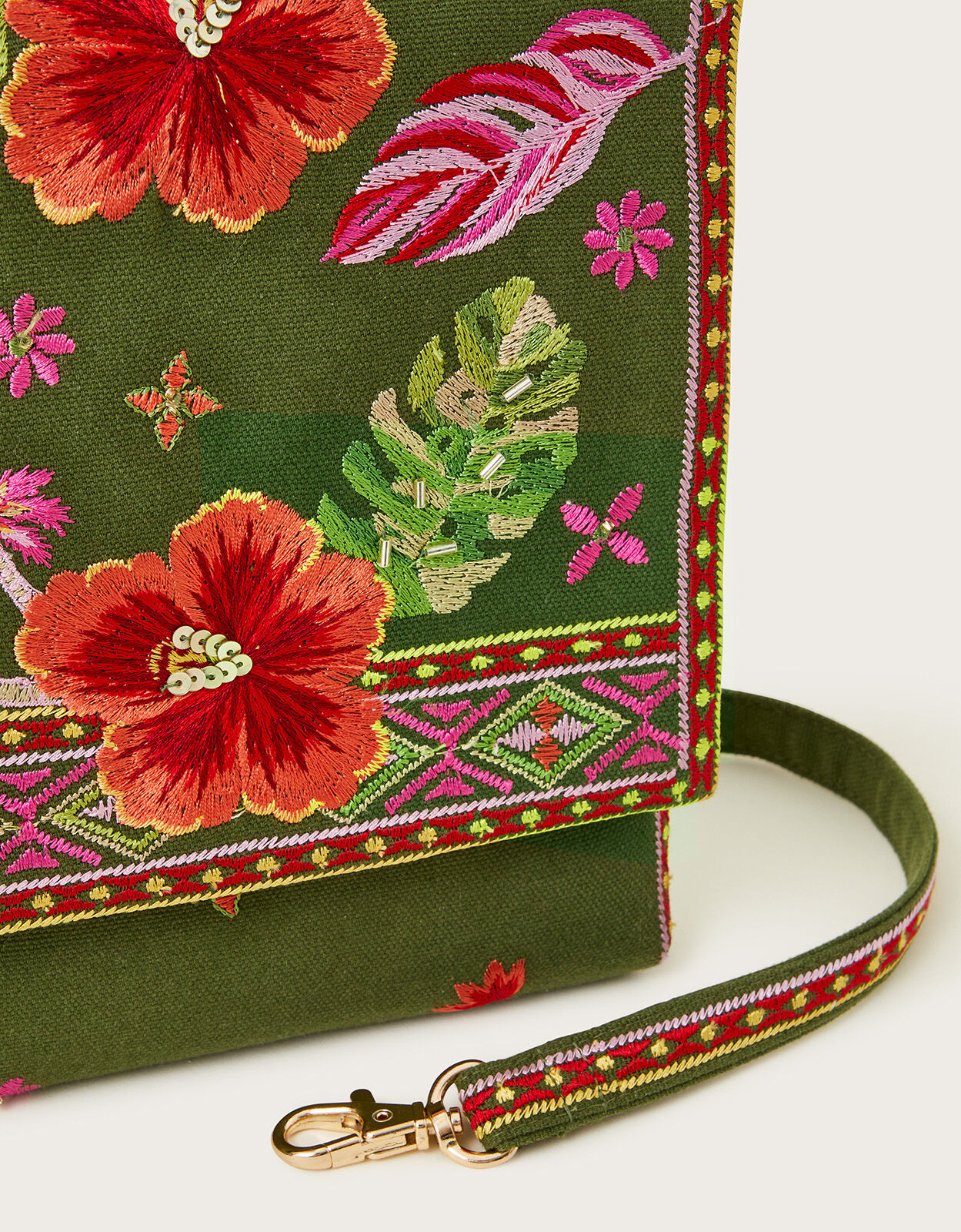 Embroidered cross body bag sales