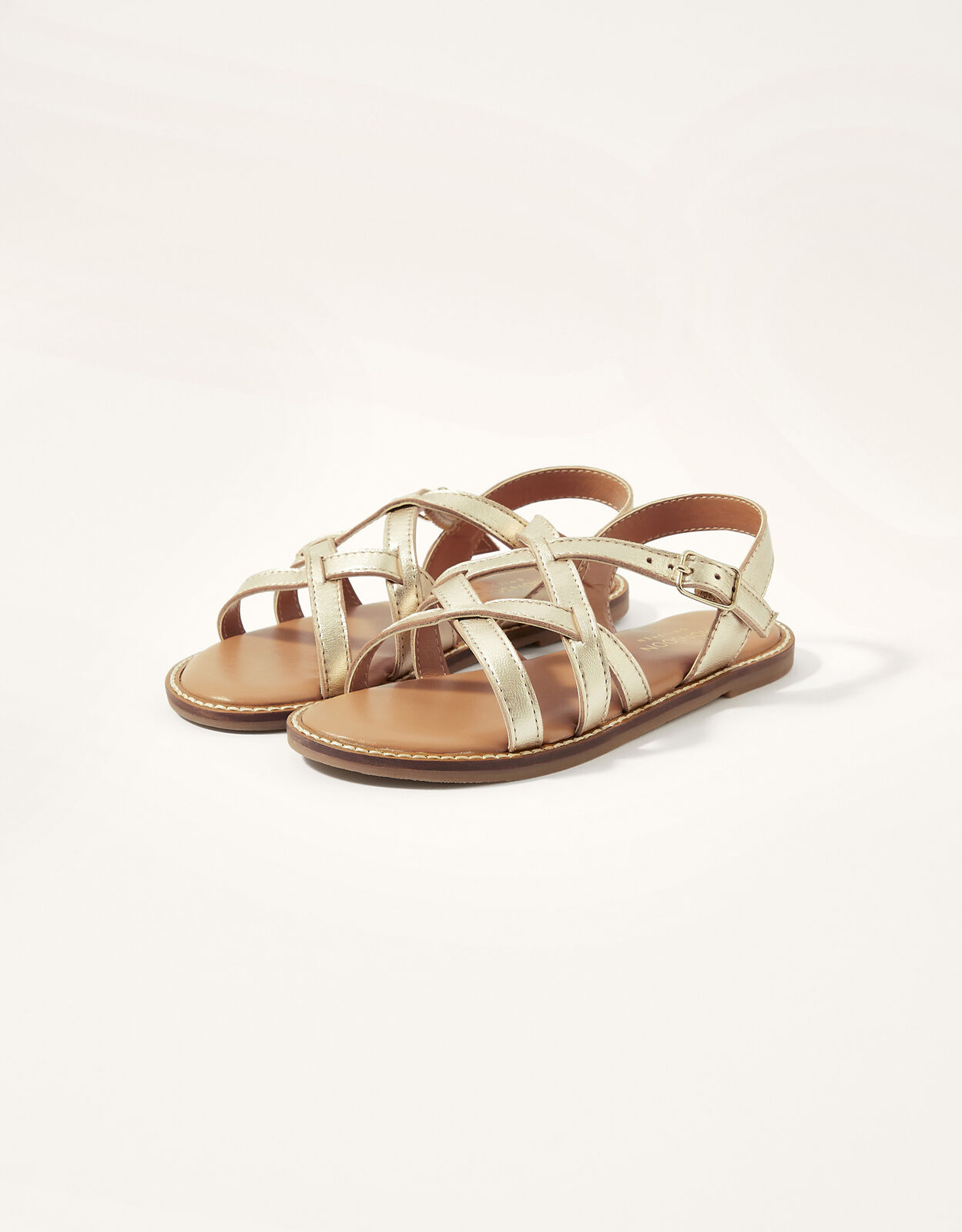 Gold cross sales strap sandals