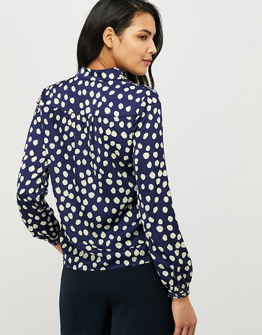 navy and white spotted tops