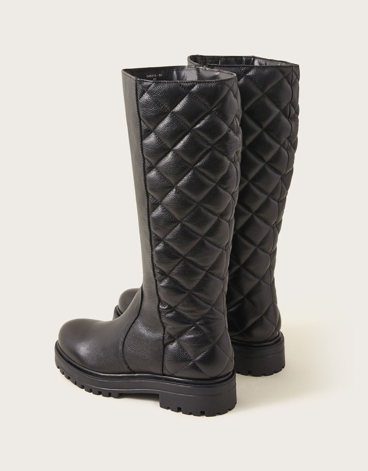 Black quilted hot sale boots