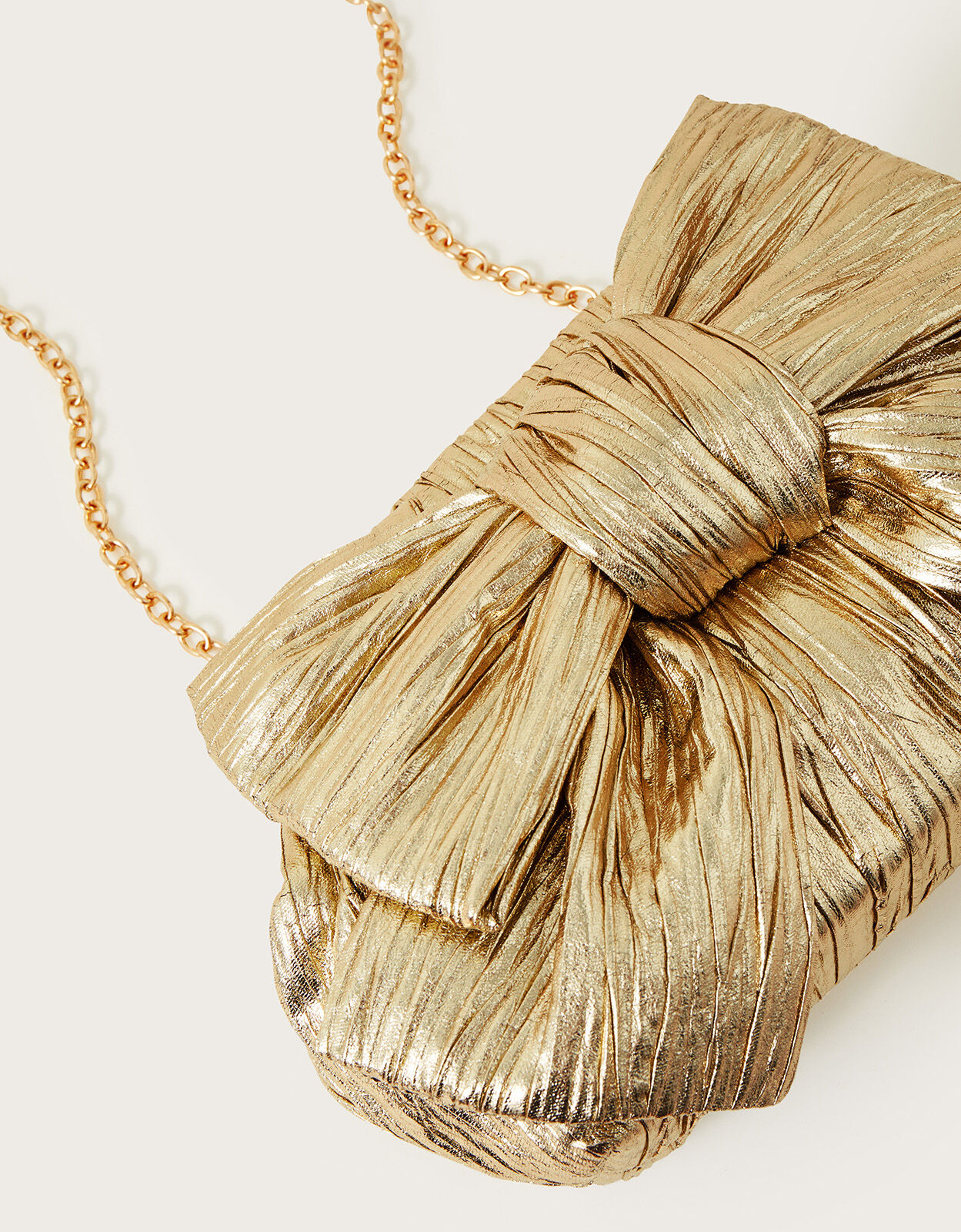 Oversized Bow Metallic Bag