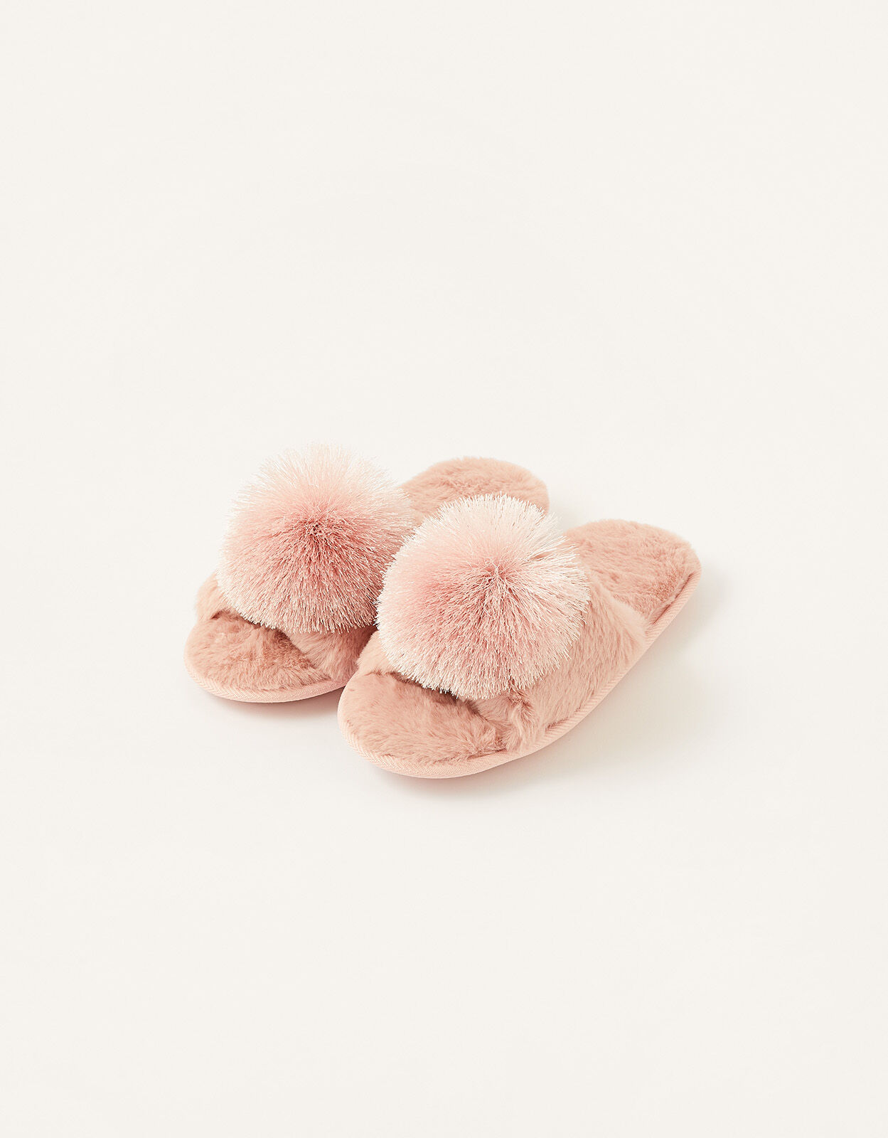 Pink slippers with pom pom top