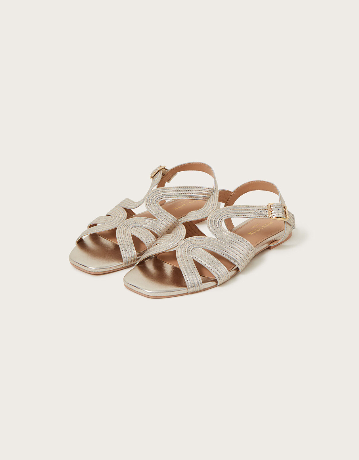 Gold new arrivals crossover sandals