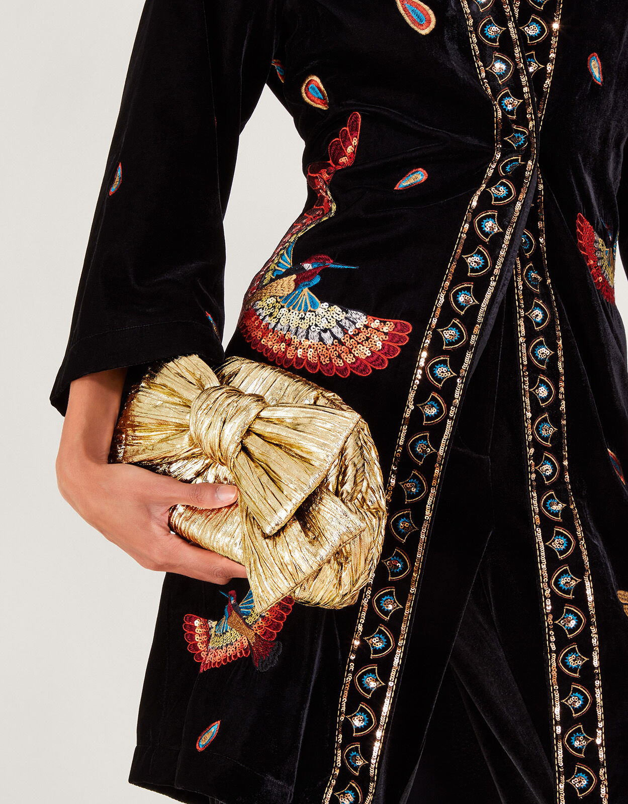 Monsoon gold bag best sale