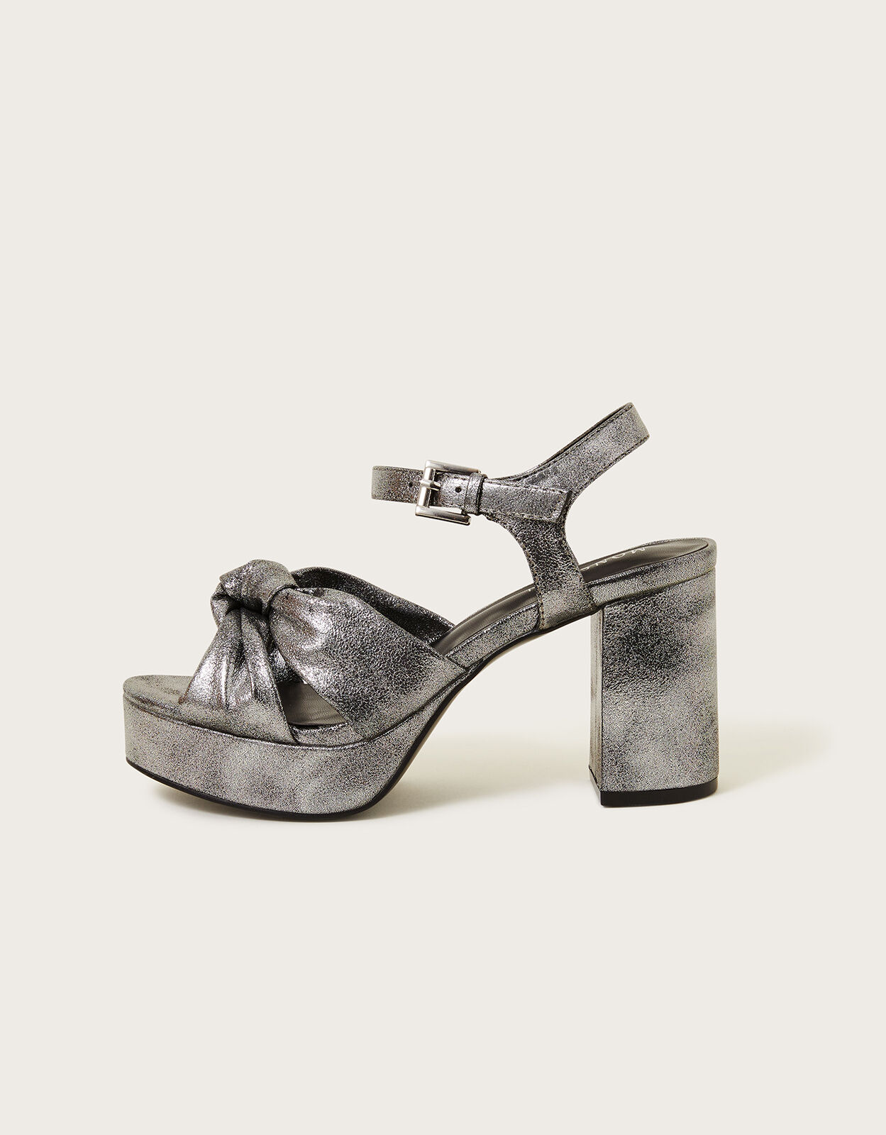 Buy Silver Tarifa Leather Platform Heels by OROH Online at Aza Fashions.
