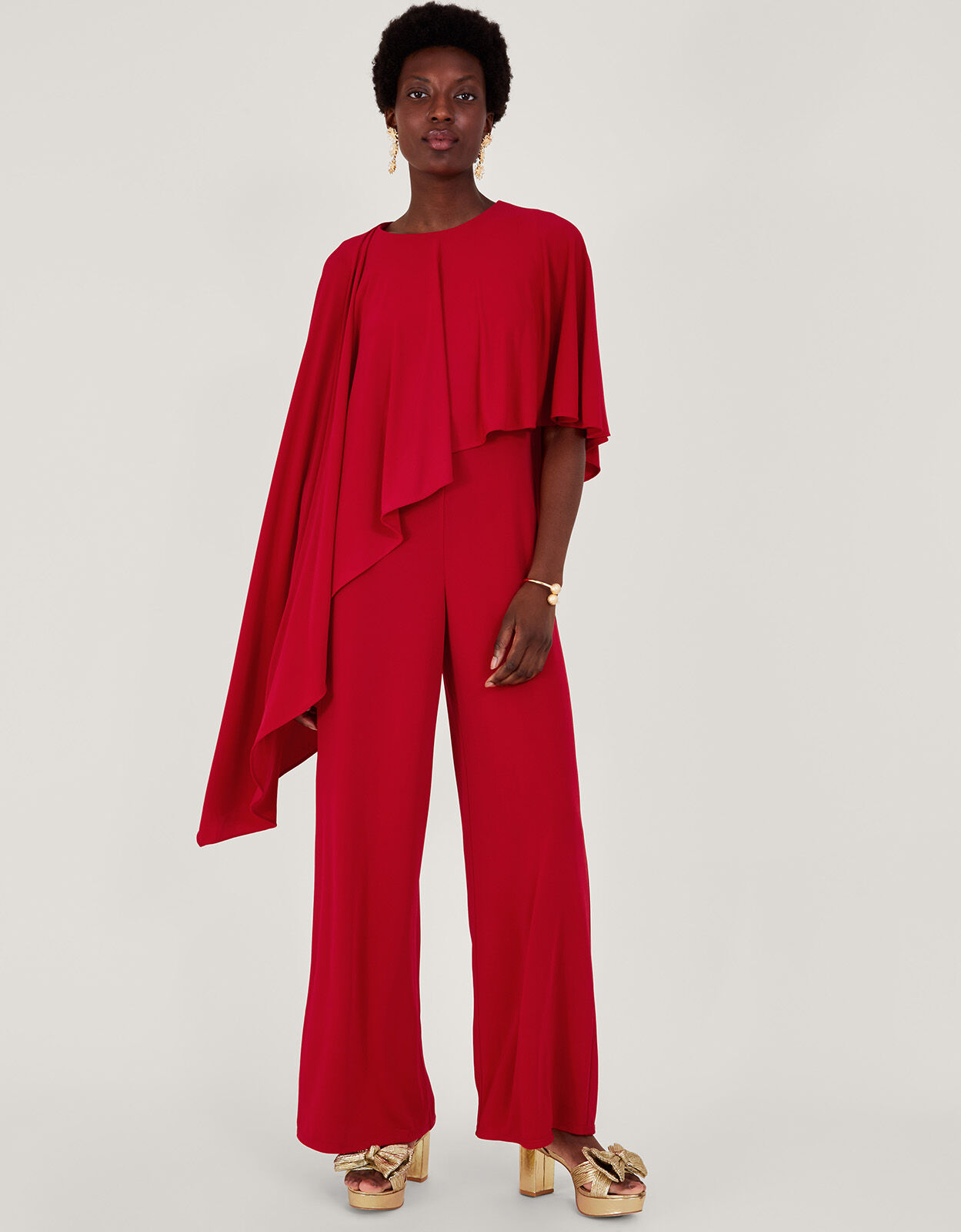 Red pantsuit with hot sale cape