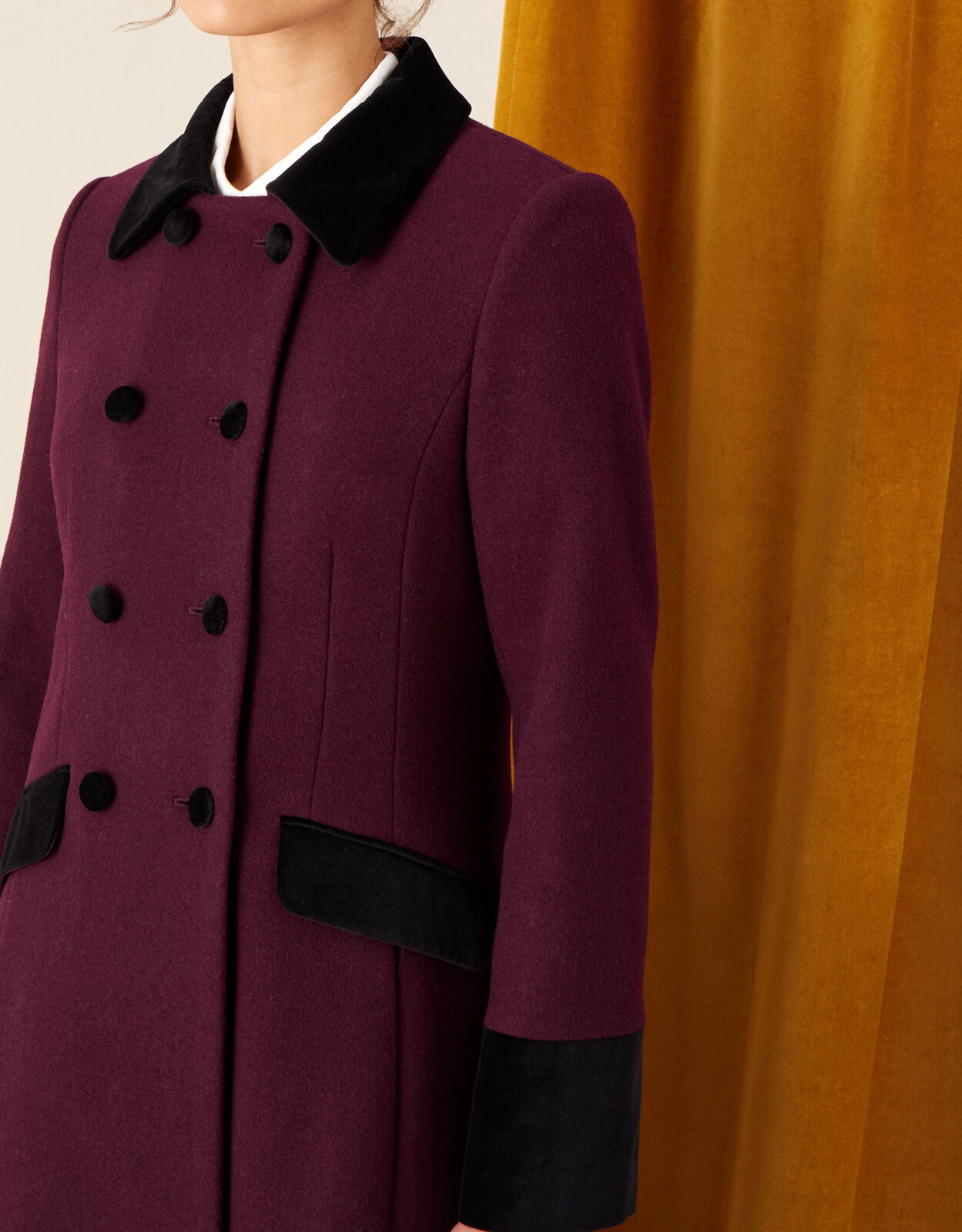 red skirted coat