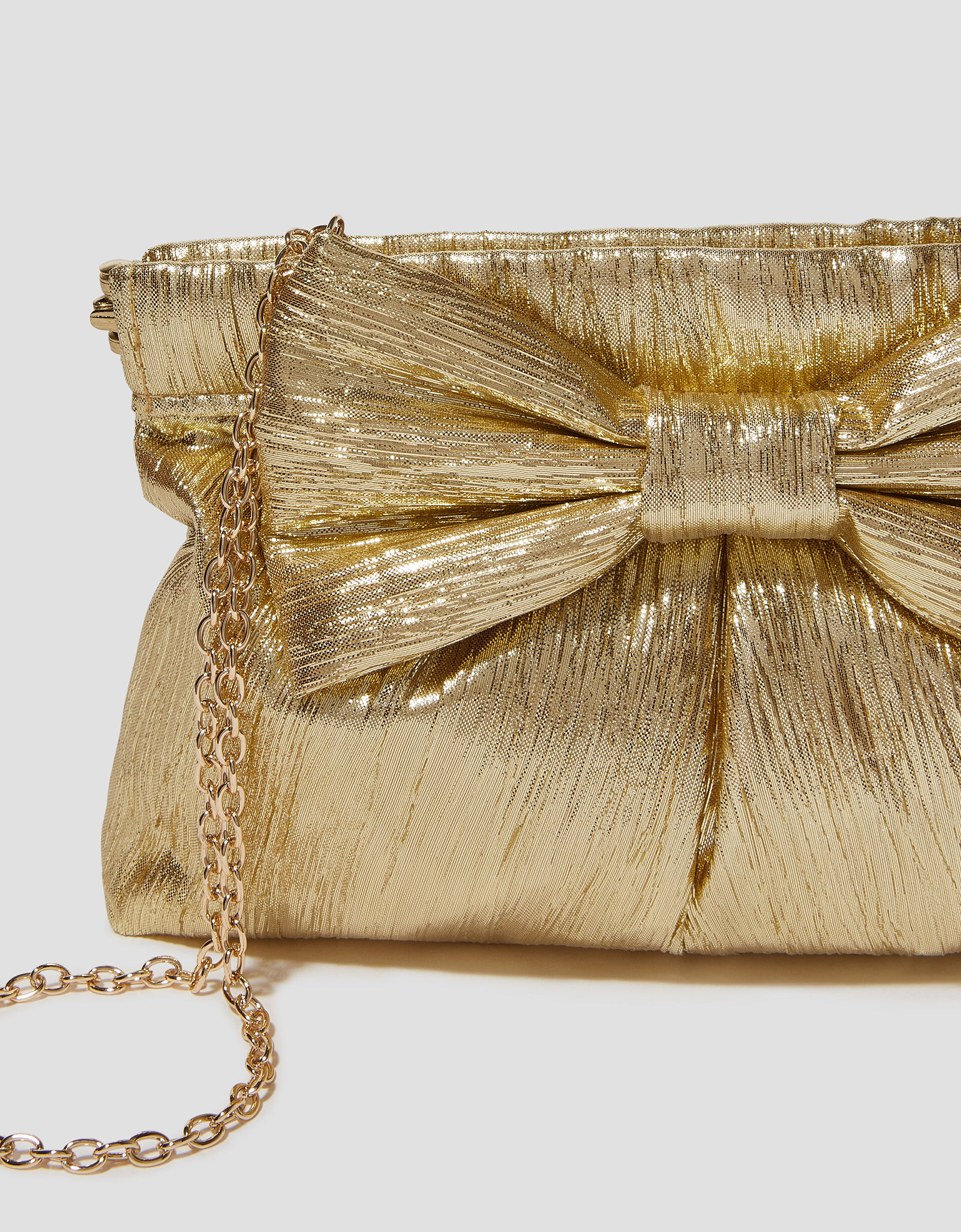 Monsoon gold bag shop