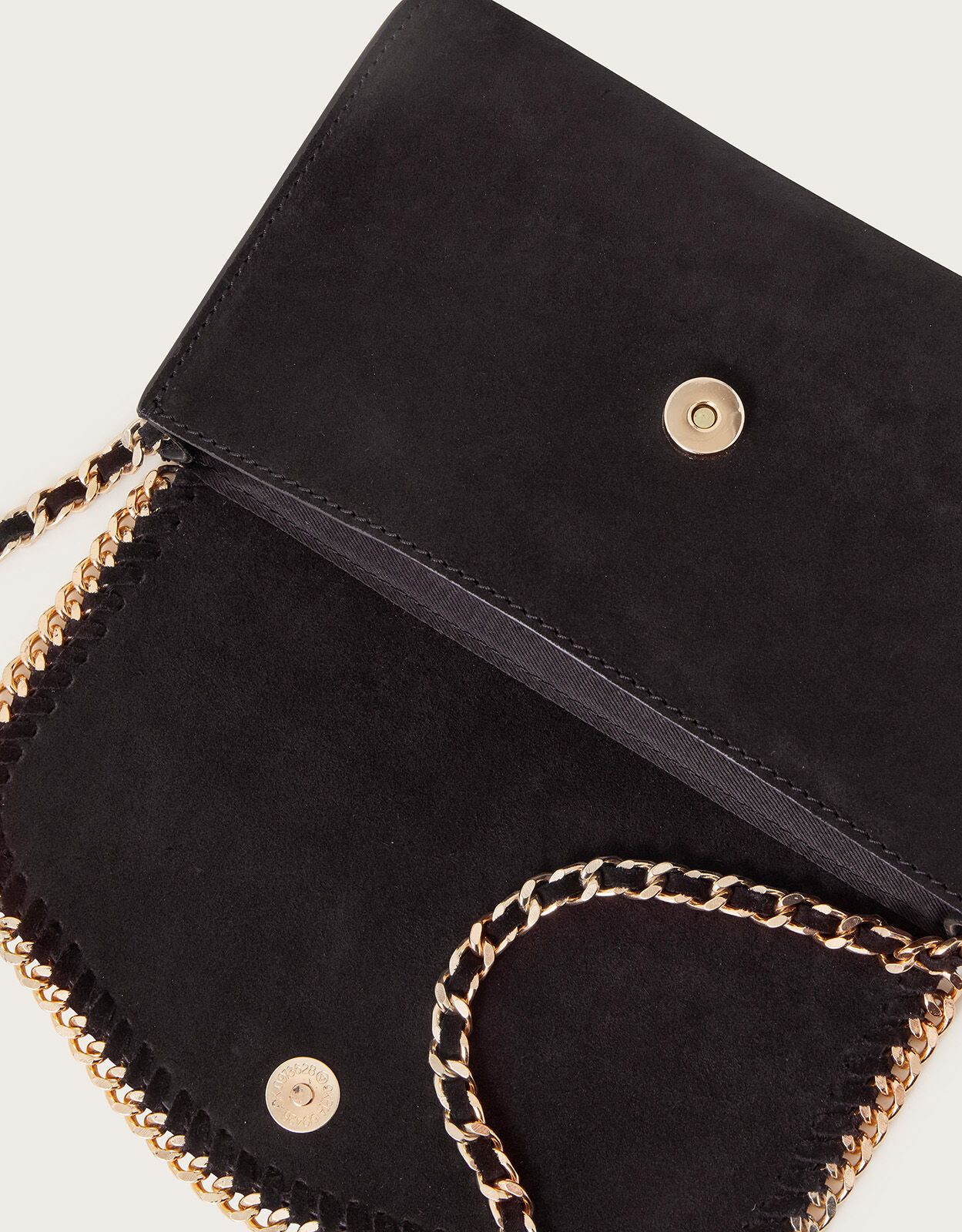 Black suede bag with gold chain on sale