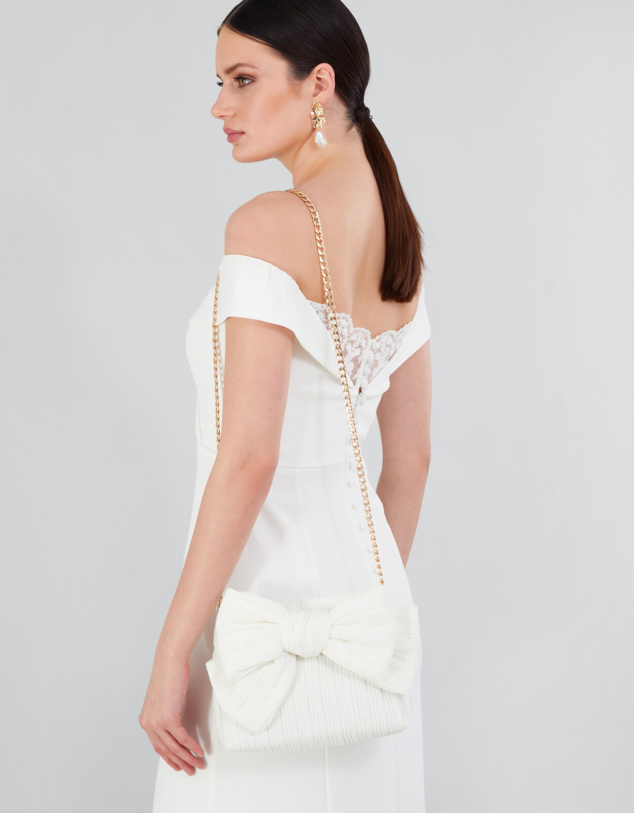 White bow clutch bag top