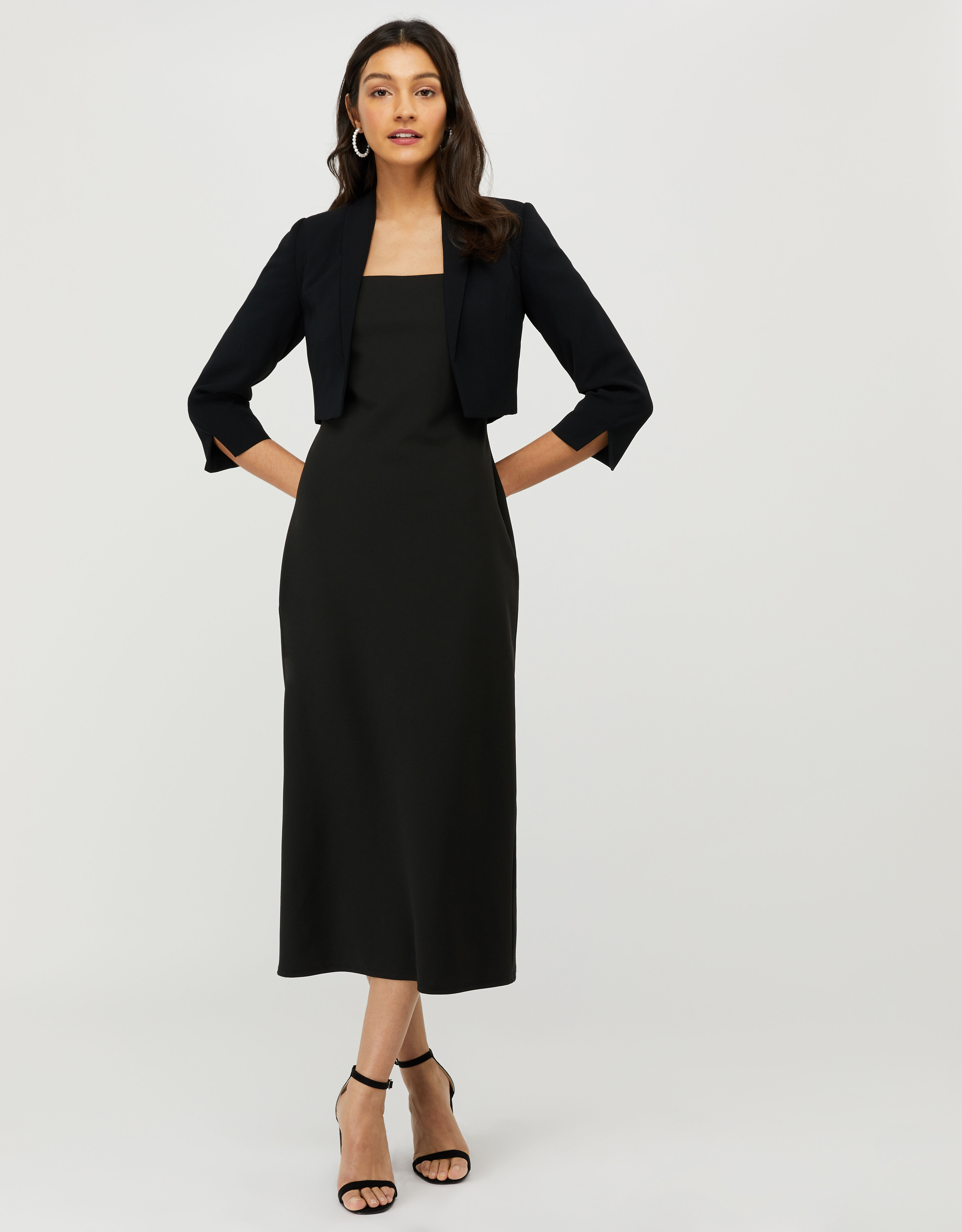 cropped jacket over dress