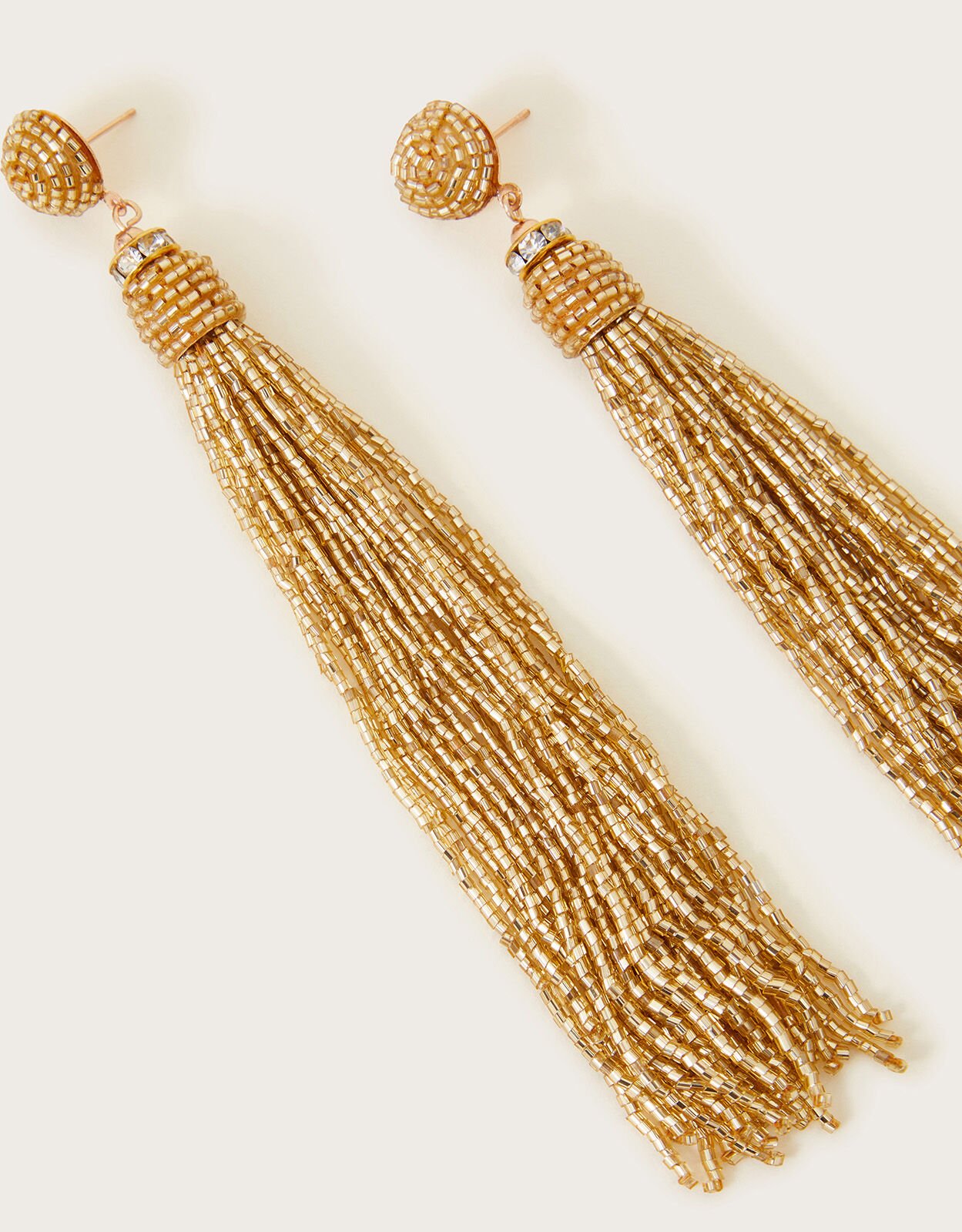 Gold beaded outlet tassel earrings