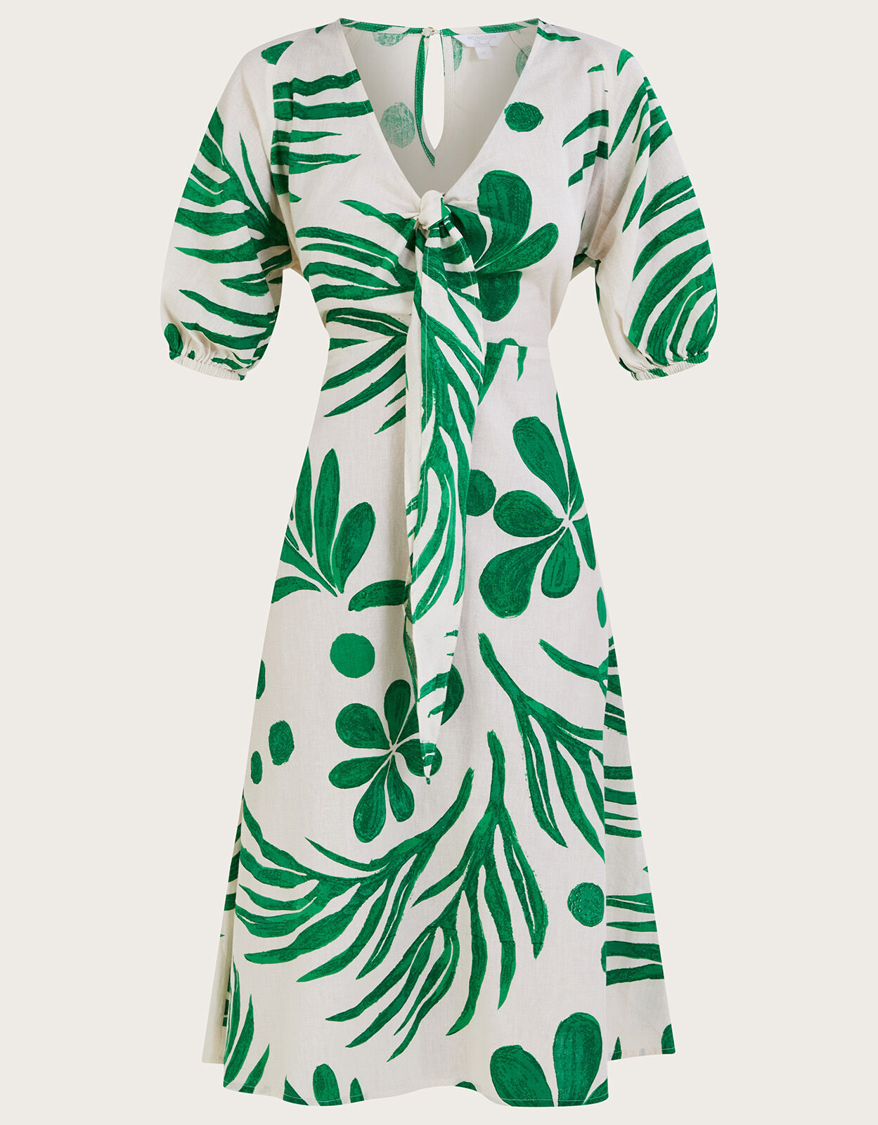 White dress with green leaves discount