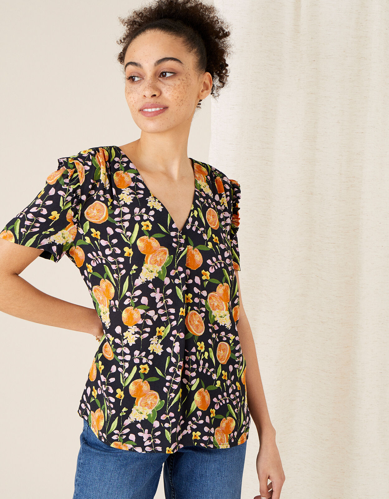 navy ruffle sleeve top