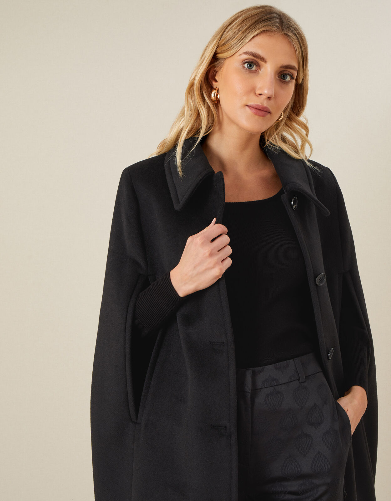sleeveless wool coat