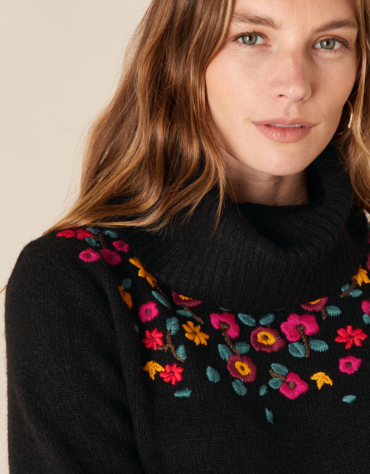 Black jumper with embroidered flowers top