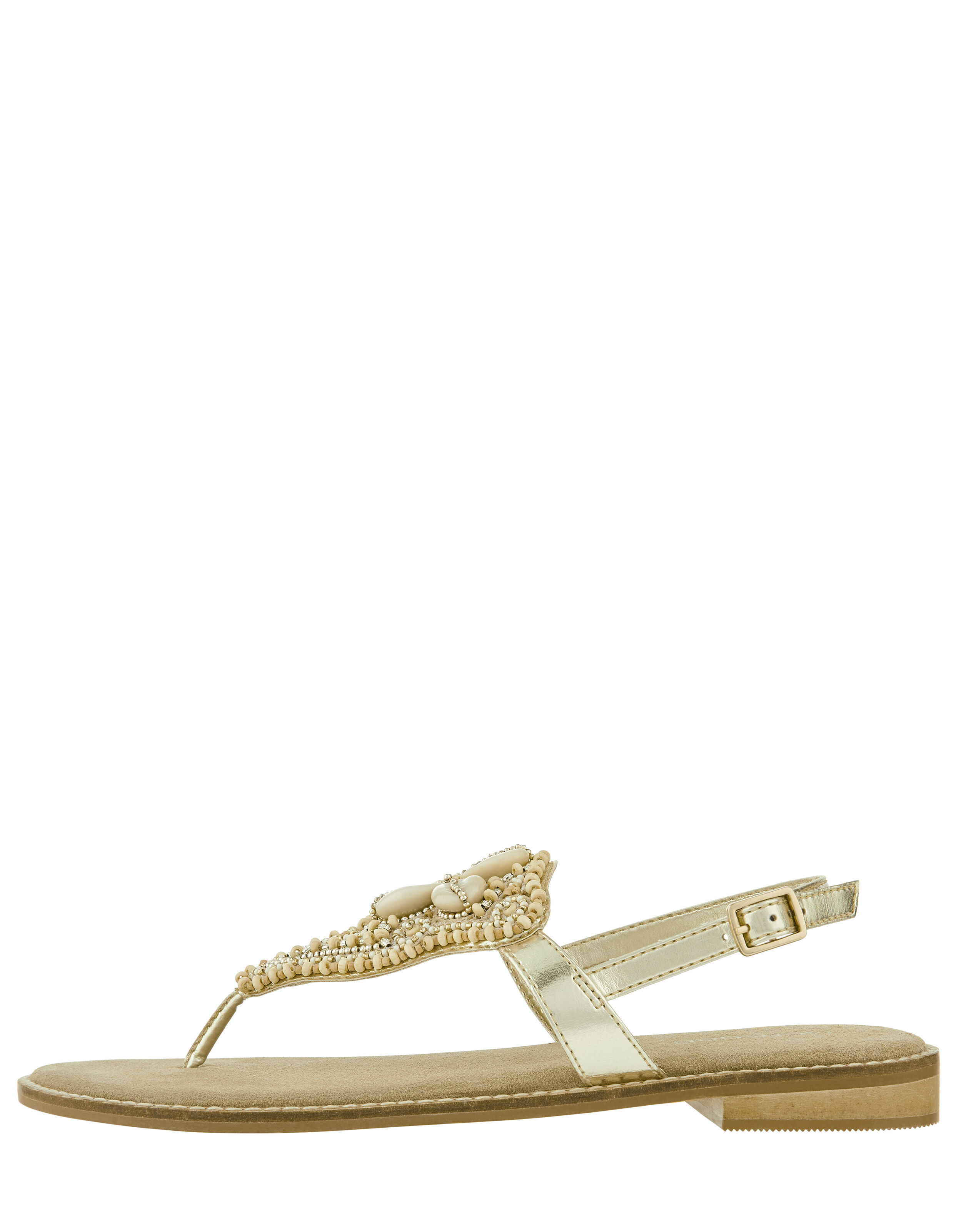 shell toe gold shoes