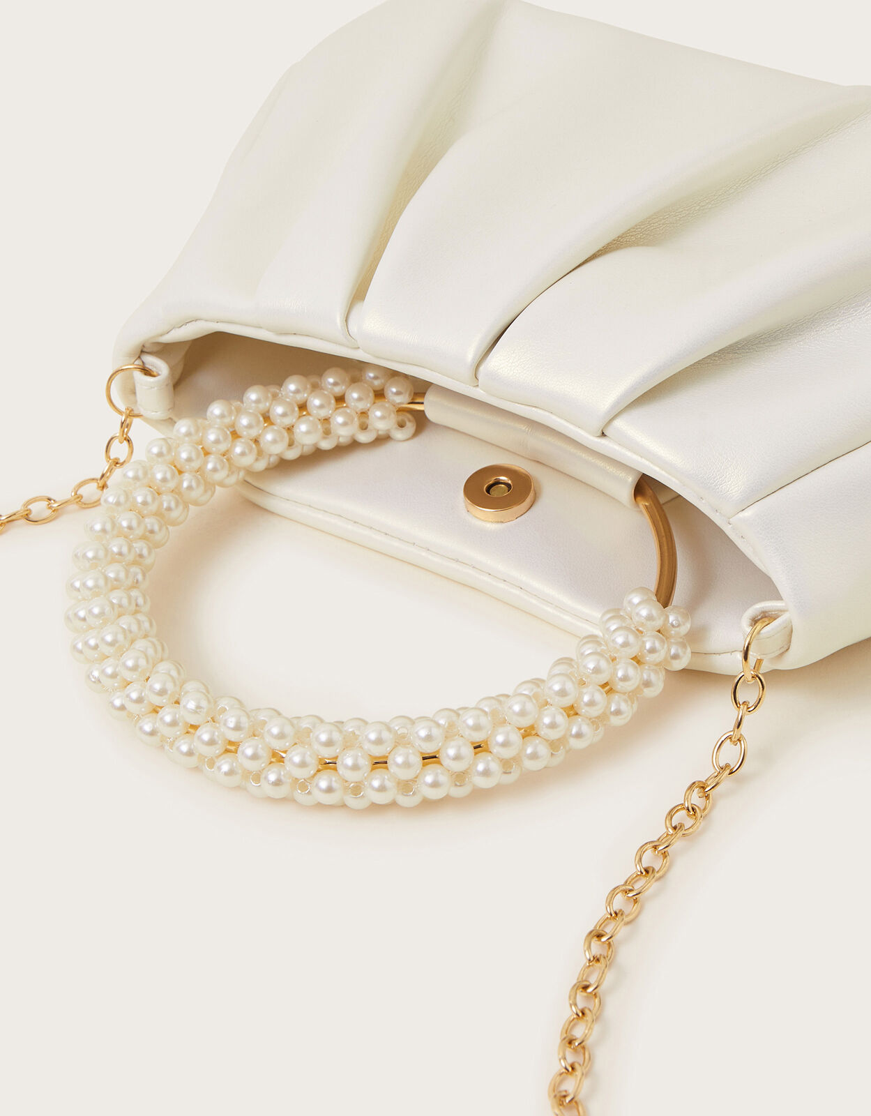 Pearl bag handle clearance