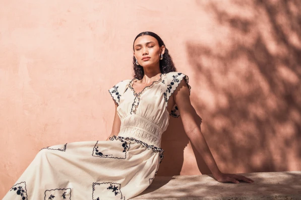 white with black trim dress